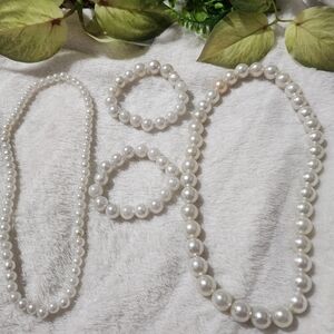 Handmade plastic pearl look alike beaded necklaces and bracelets